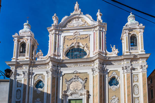 Church in Finale Ligure Facade of the main church of the village of Finale Ligure on the Italian Riviera finale ligure stock pictures, royalty-free photos & images