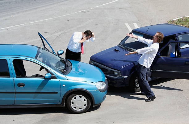 istock Traffic accident and two drivers fighting 144365870