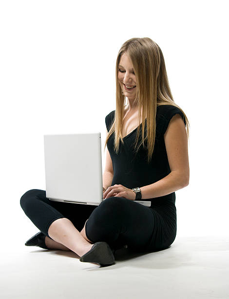 Woman with laptop computer stock photo