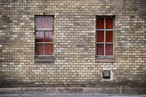 istock Old brick wall, building detail windows 1443666354