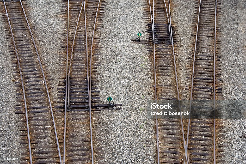 Rails diverging rails. both horizontal and vertical compositions available. Deterioration Stock Photo