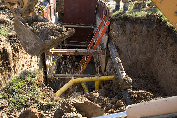 istock Backhoe Digging around gas and electric utility 144366910