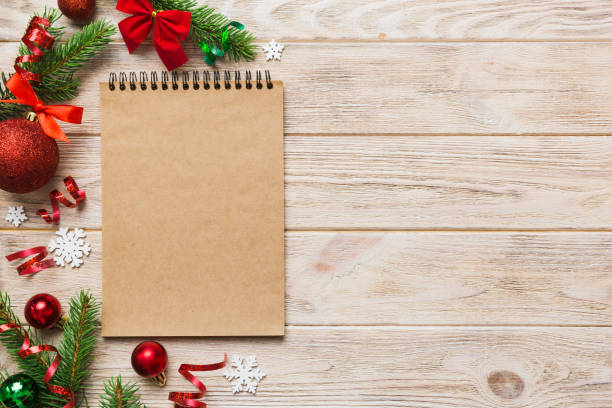 istock Christmas blank greeting card mock-up scene. Creative layout made of Christmas tree branches and paper card note. Flat lay. Nature New Year concept 1443672699