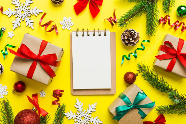 istock Christmas blank greeting card mock-up scene. Creative layout made of Christmas tree branches and paper card note. Flat lay. Nature New Year concept 1443672718