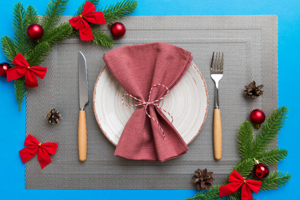 istock Christmas dinner background with rustic decorations and kitchen utensil . View from above 1443672864