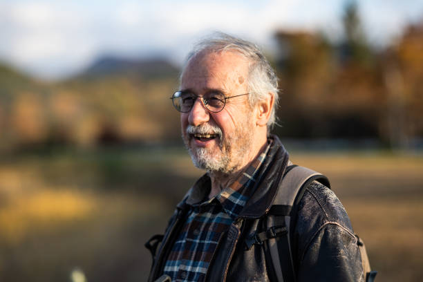 istock Happy senior man walking outdoors portrait 1443676466