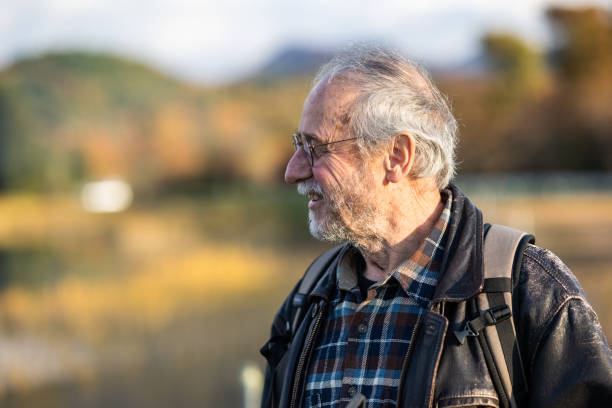 istock Happy senior man walking outdoors portrait 1443676470