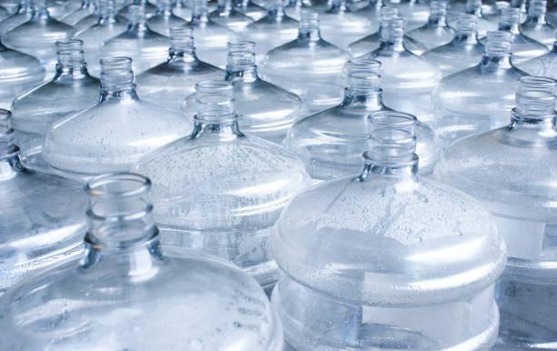 istock Pattern of 19 liter gallon plastic water bottle 1443678956