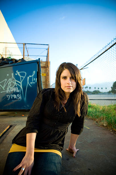 young woman near industrial stock photo