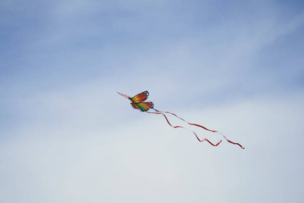istock colorful Kite and blue Sky 1443684173