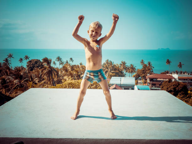 boy fooling around outdoors