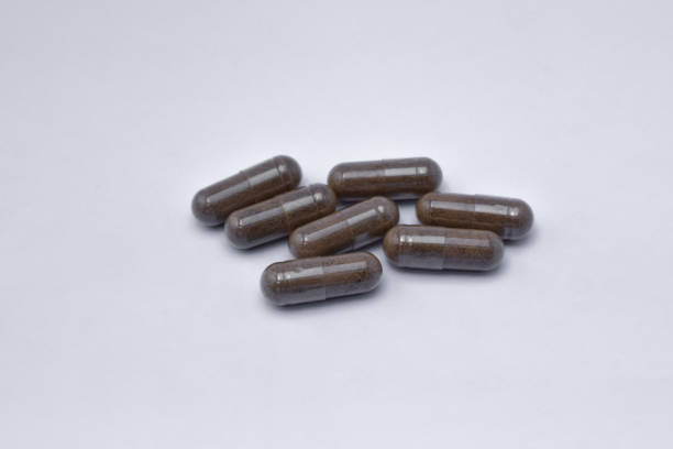 istock Black Seed with a mixture of propolis in a capsule (Habbatusauda) 1443714926