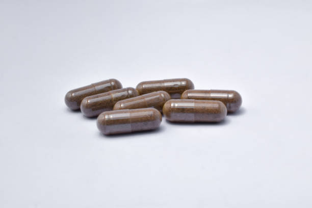 istock Black Seed with a mixture of propolis in a capsule (Habbatusauda) 1443714952