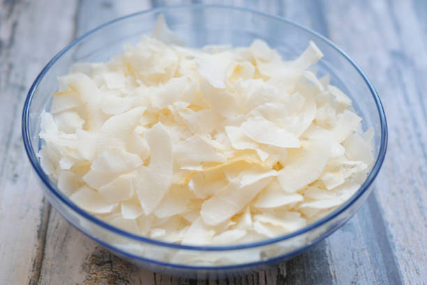istock slice of fresh coconut flakes in a bowl on a table 1443717085