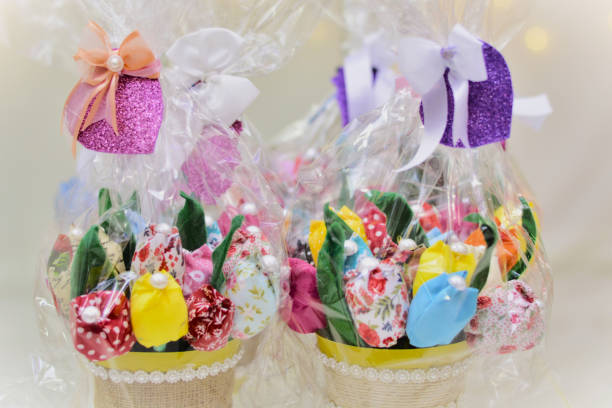 istock Various handmade flowers from colorful cloths decorating vase 1443717386