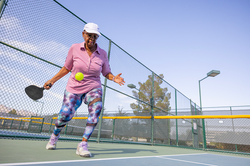 People playing pickleball on outdoor courts