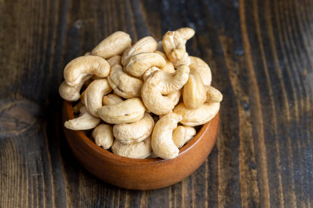 istock Fresh peeled cashew nuts on the table 1443734719
