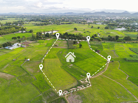 Land plot for building house aerial view, land field with pins, pin location for housing subdivision residential development owned sale rent buy or investment home or house expand the city suburb