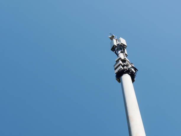 istock Steel cell tower antenna on blue sky background 1443738508