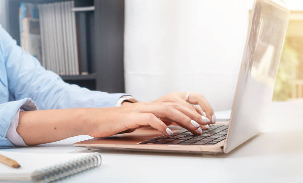 istock Woman working online on laptop 1443742660