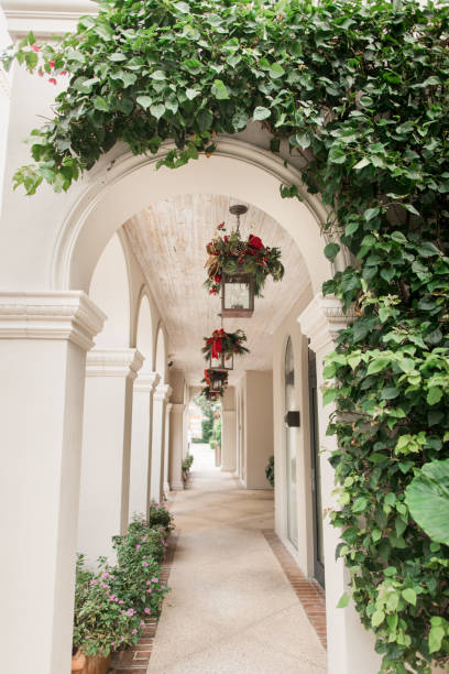 istock Festive Red & Green Christmas Decor in Bright White Rustic Modern Palm Beach Architecture for a Merry & Bright Christmas in South Florida in December 2022 1443744567