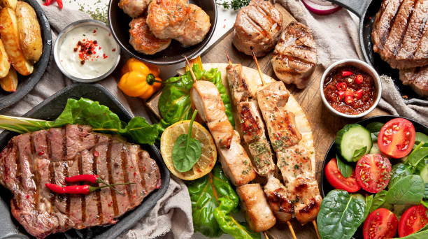 istock Meat dishes. Plates of various meat 1443747428
