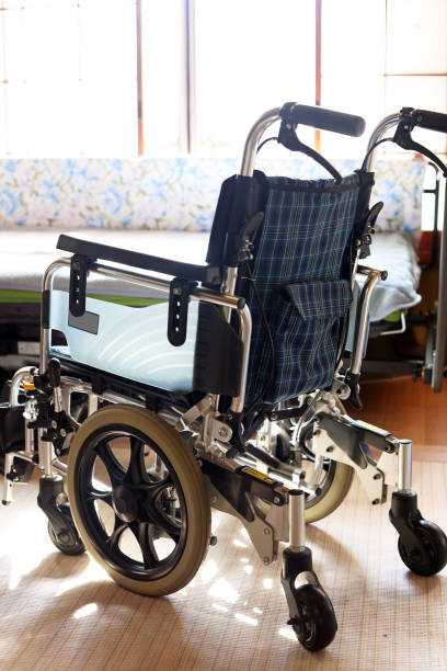 istock Small wheelchair and nursing bed 1443749464