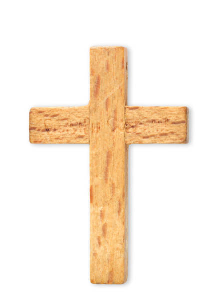 istock A simple wooden cross on a white background. 1443754272