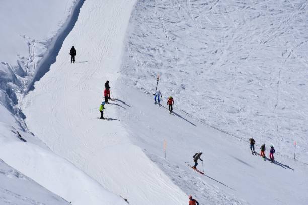 istock Group of skiers on the mountain slope 1443761433