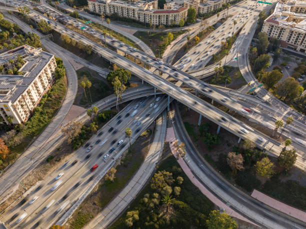 istock Traffic at Los Angeles freeway interchange, aerial view 1443763848
