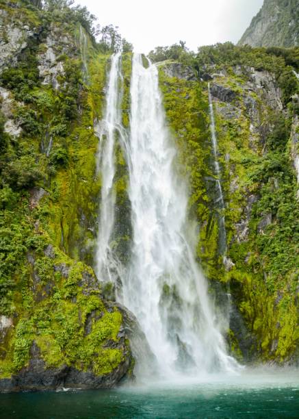 istock Vertical shot of a waterfall over the rocks 1443774925