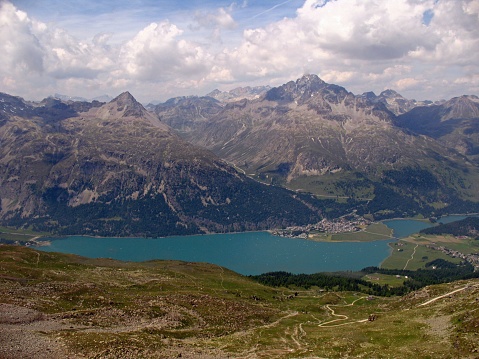 View of mountains and lake Silvaplanersee from Corvatsch in the Swiss Alps just outside St Moritz