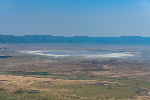 A beautiful landscape view of the Ngorongoro crater in Tanzania on a sunny day