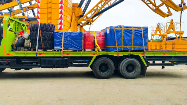 istock A cargo truck loaded with tire, drum and pallet boxes. 1443778626