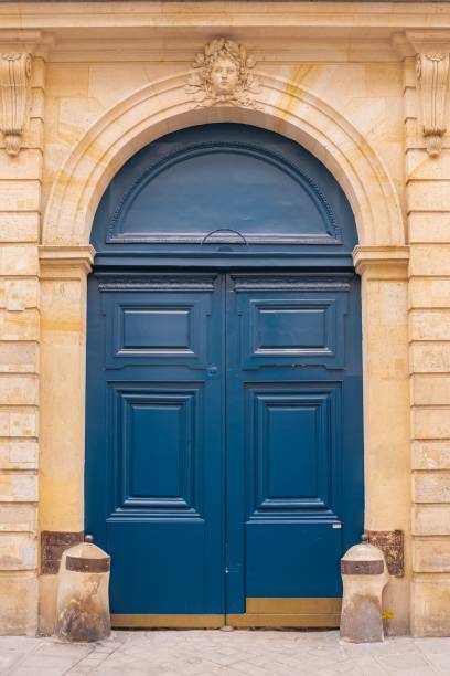 istock Paris, wooden massive door 1443780584
