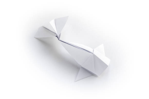 istock Paper fish origami isolated on a white background 1443780833