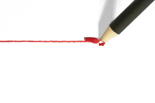 istock Red pencil with a broken rod drawing a line 1443791105