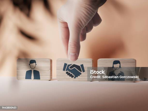 Wooden Blocks With An Icon Of A Woman And A Man And Mediation Stock Photo - Download Image Now