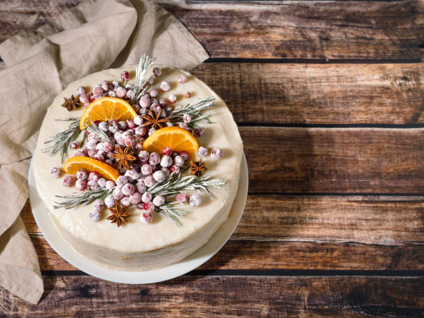istock Cristmas cake decorated rosemary cranberries 1443802397
