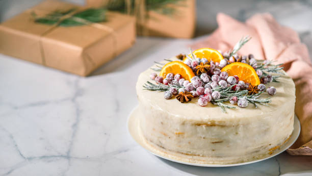 istock Cristmas cake decorated rosemary cranberries 1443805150