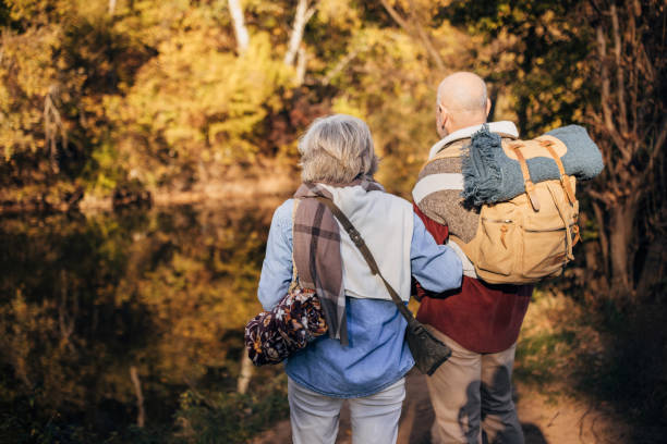 istock Old couple by the river 1443807161