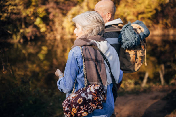 istock Old couple by the river 1443807289