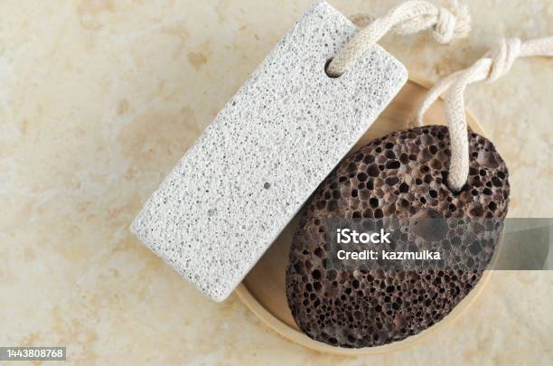 Two Volcanic Pumice Stones With Strings Natural Spa And Foot Calluses Removal Top View Copy Space Stock Photo - Download Image Now