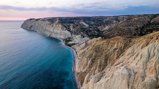 Sunset near cape Aspro cliffs aerial panorama from drone, Limassol, Cyprus