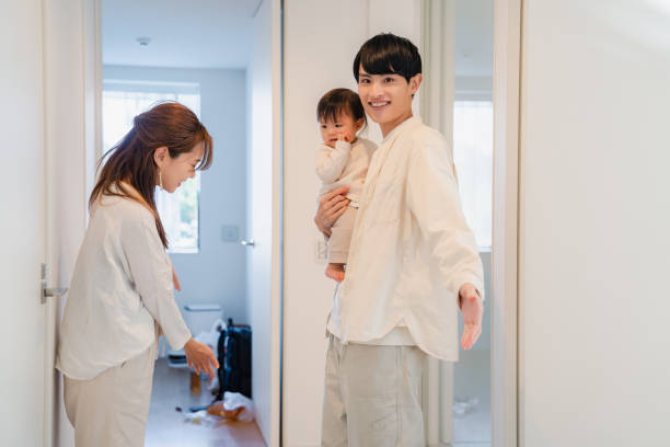 istock A young family inviting guests to their home 1443813625