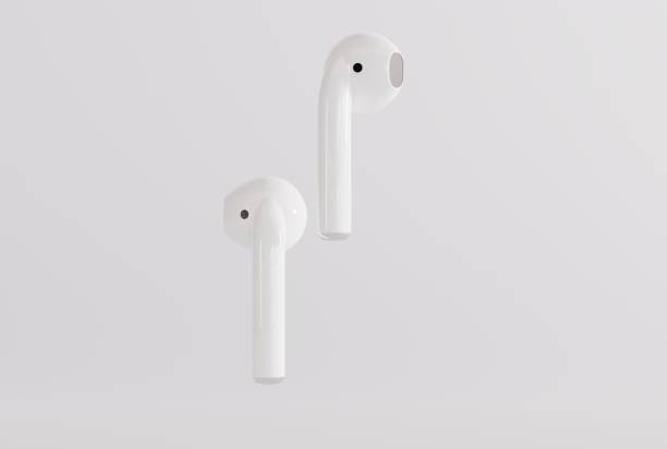 istock Wireless earbuds, earphones on a light background. 1443814393