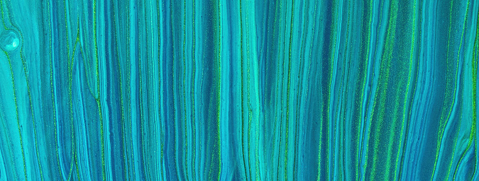 Abstract fluid art background light blue and green glitter colors. Liquid marble. Acrylic painting on canvas with turquoise gradient. Watercolor backdrop with striped pattern. Stone section. Abstract fluid art background light blue and green glitter colors. Liquid marble. Acrylic painting on canvas with turquoise gradient. Watercolor backdrop with striped pattern. Stone section.