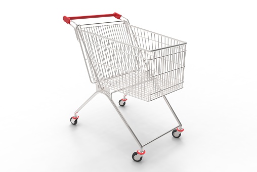 Side view of a metal shopping cart filled with a large variety of colorful groceries that includes some fresh vegetables, fruits, canned food, fruit juice, cooking oil and three loafs of bread. The cart is standing on reflective white background producing a soft reflection under it. The cart has a red plastic handle. DSRL studio shot with Canon EOS 5D Mk II  