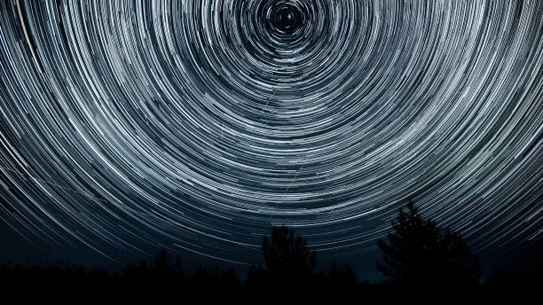istock Star trails in the night sky 1443818763