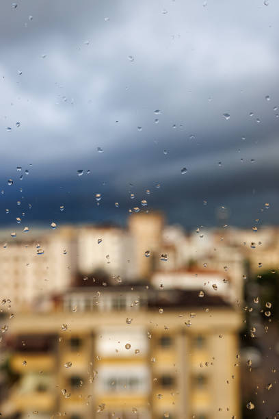 istock Raindrops on the window glass, A rainy day 1443819142